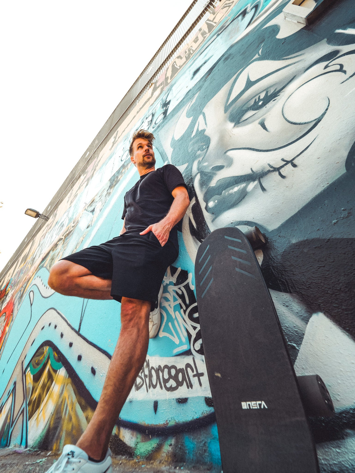 ONSRA electric skateboard riding photo