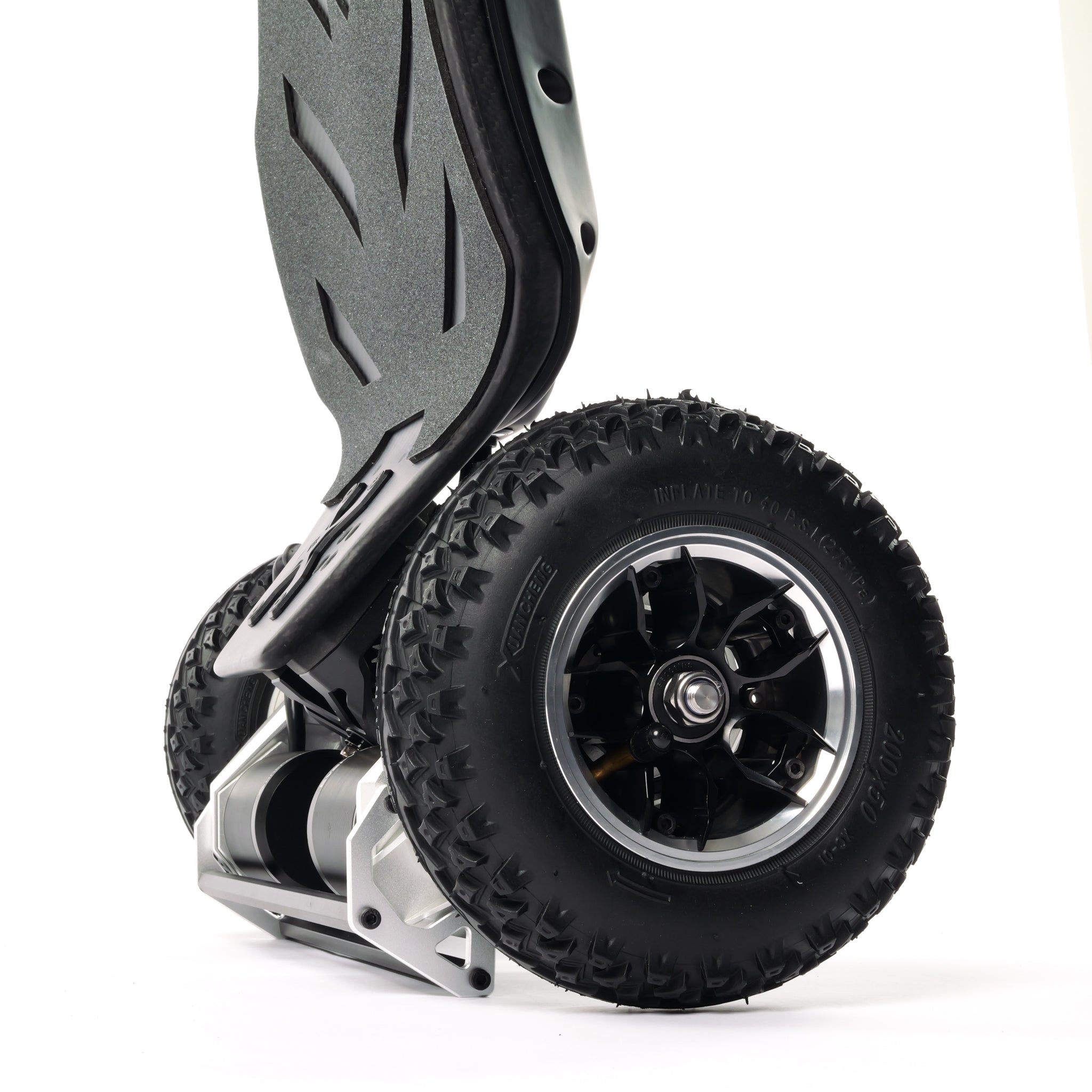 ONSRA electric skateboard riding on off-road terrain in the USA