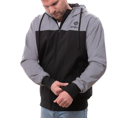 Kevlar armored motorcycle jacket in reflective grey and black with included CE Level 2 pads, designed for enhanced night visibility and full‑body protection.